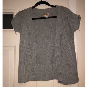 Grey button up short sleeve sweater.